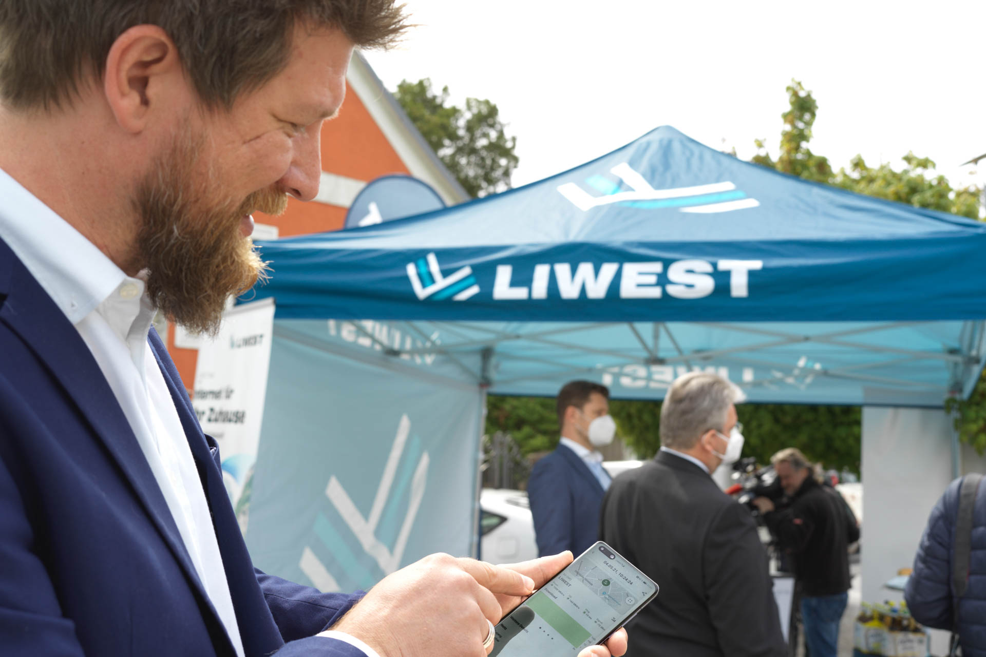 LIWEST Promostand Andreas Aigner Mobiltelefon
